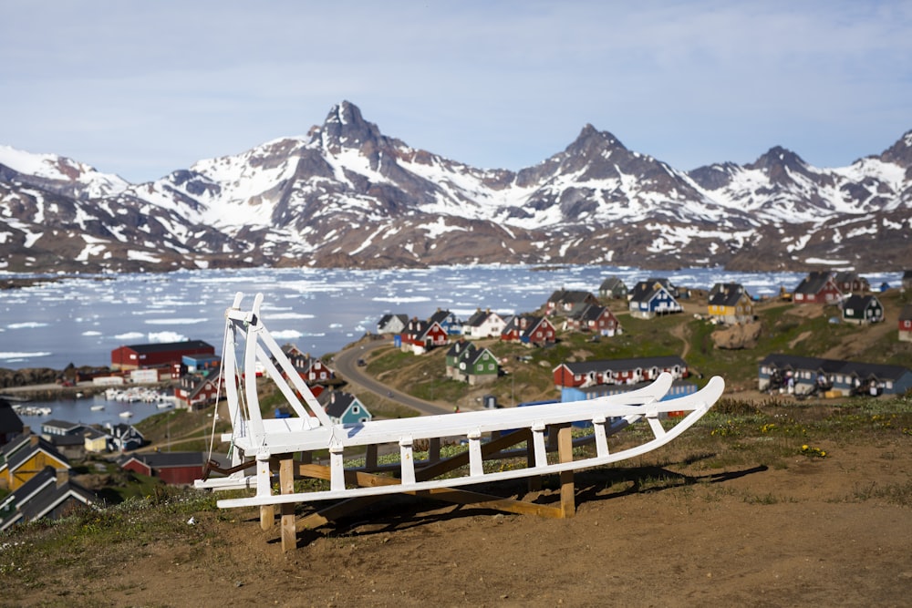 people on white wooden boat on beach during daytime