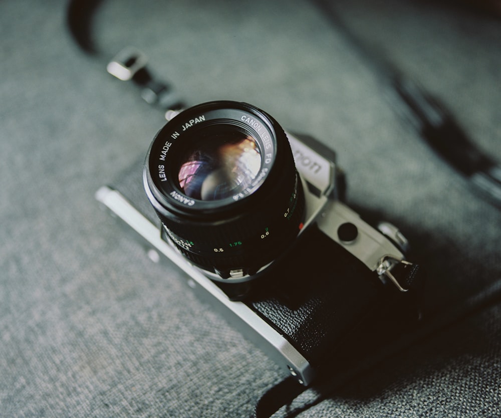 black and silver dslr camera