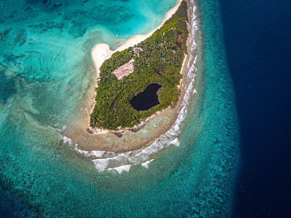aerial view of island in the middle of the sea