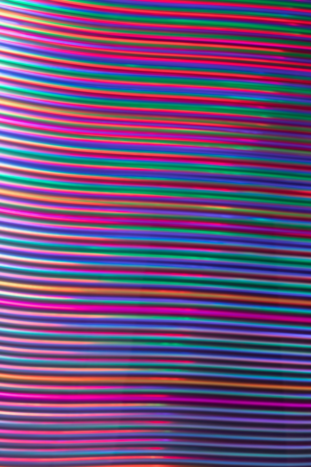 pink white and blue striped textile