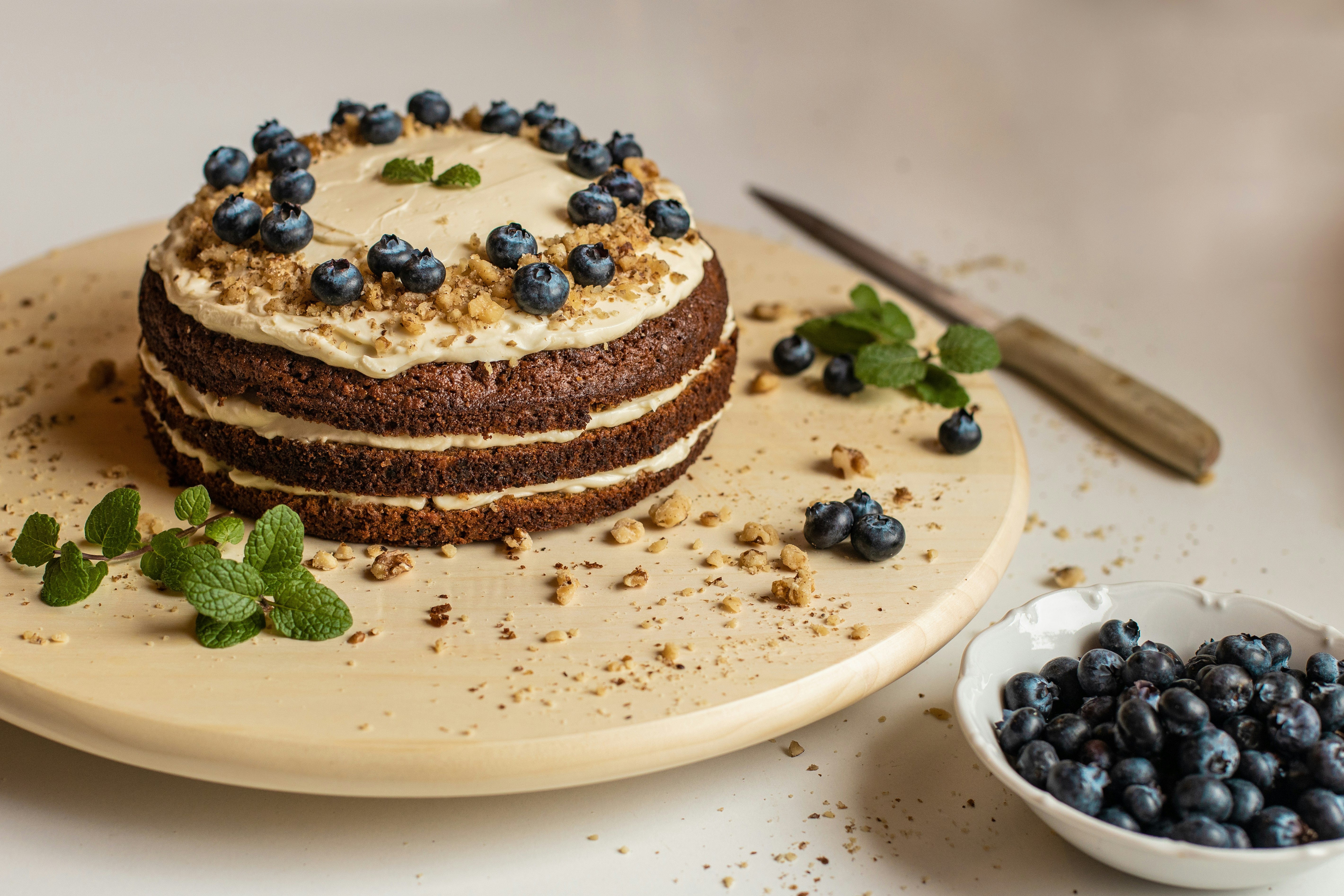 brown and white cake on white ceramic plate