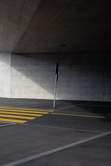 white and yellow pedestrian line
