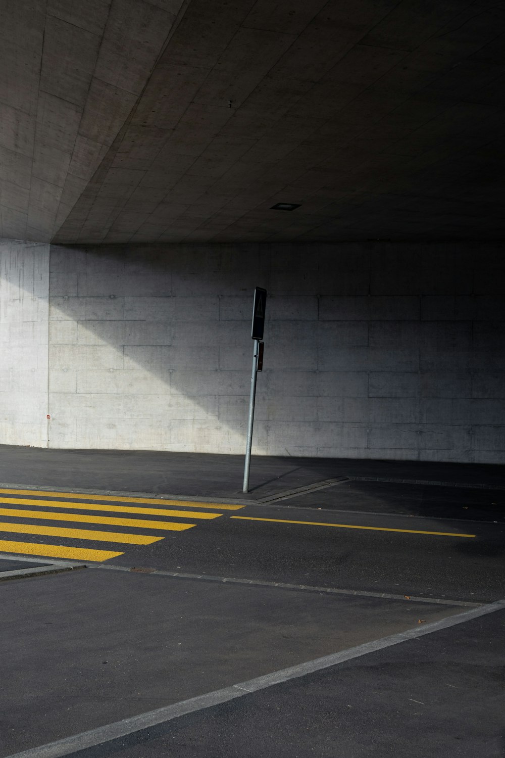 white and yellow pedestrian line