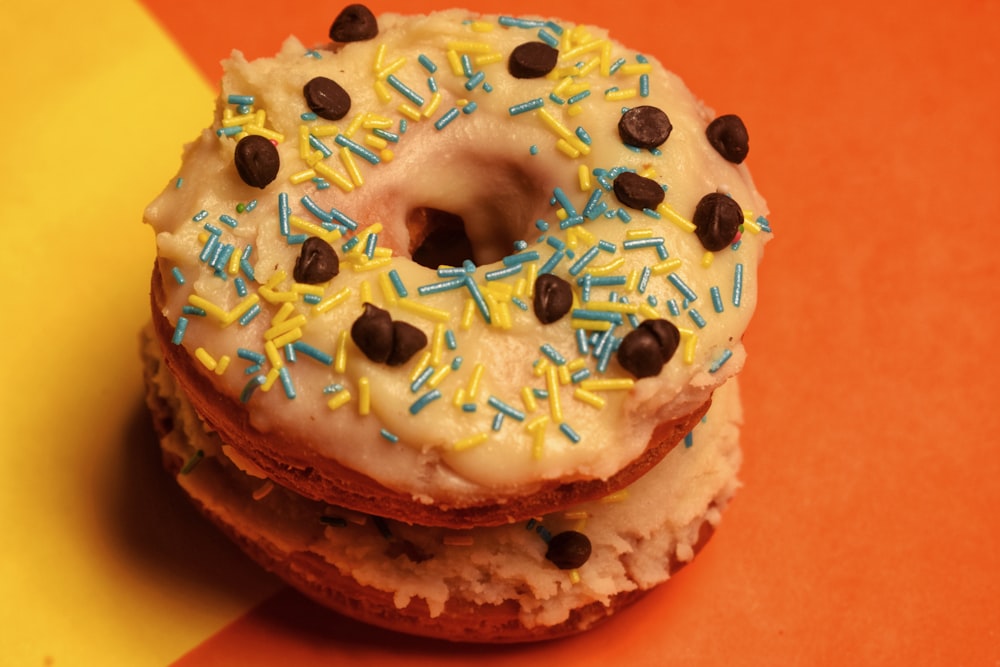 white and brown doughnut with sprinkles