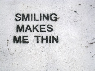 Smiling woman reflecting confidence and joy, symbolizing empowerment through female weight loss