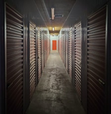 empty hallway with lights turned on in the middle