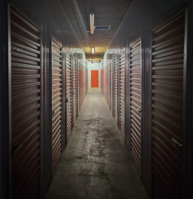 empty hallway with lights turned on in the middle