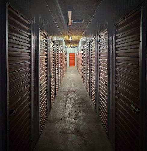 empty hallway with lights turned on in the middle