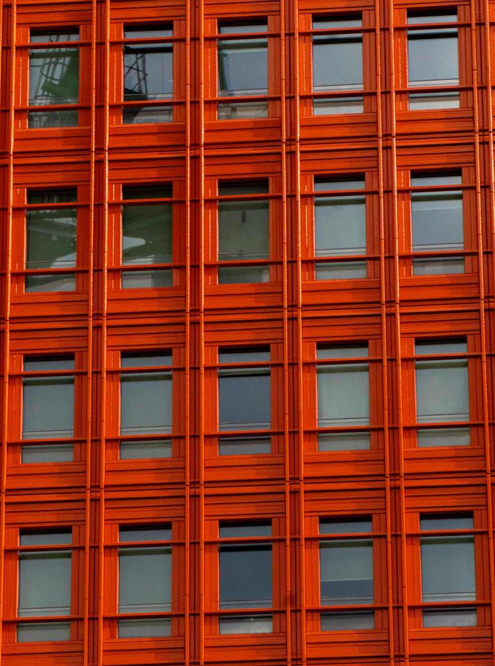 brown wooden framed glass windows