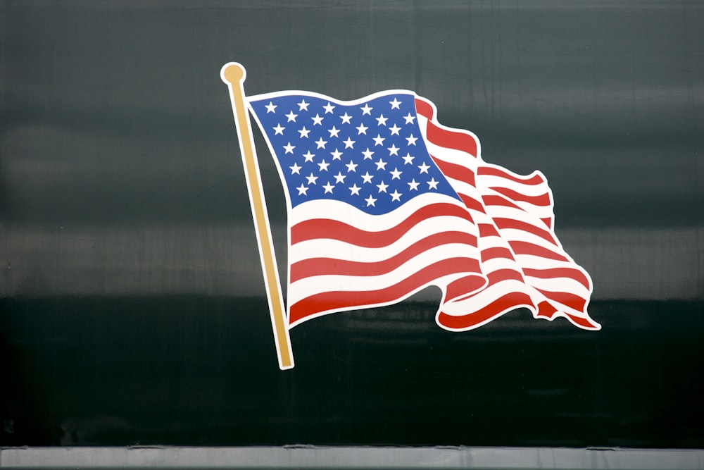 us a flag on brown wooden table