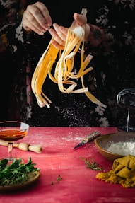 person holding yellow string lights