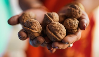 brown and black round fruits