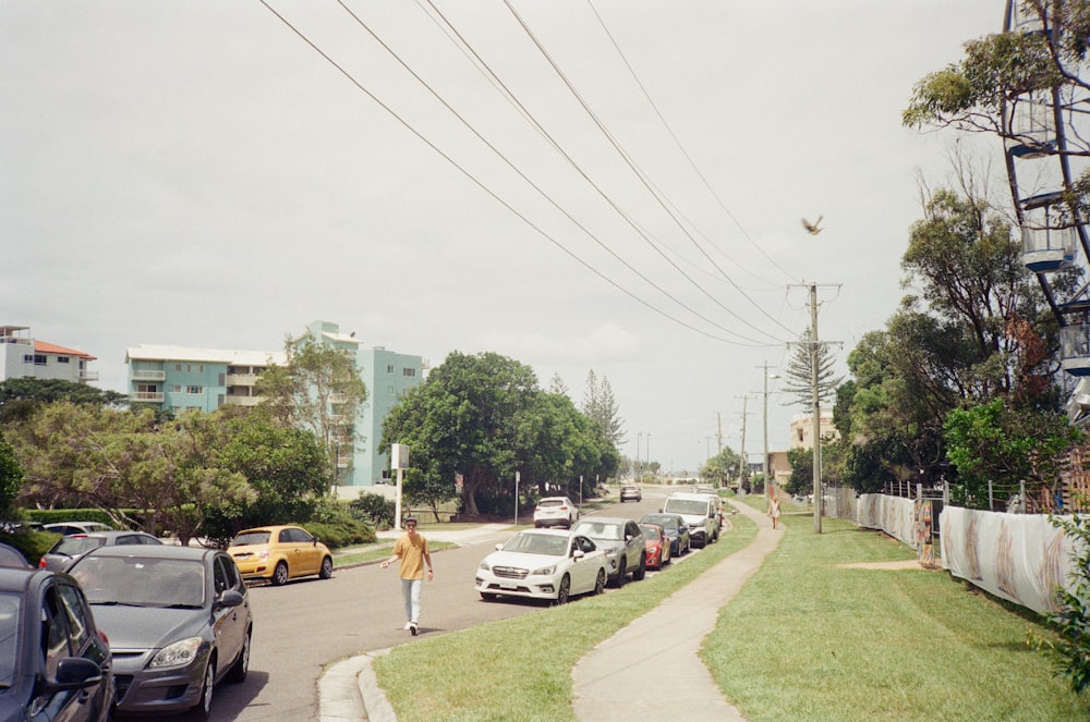 cars parked on side of the road during daytime