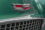 A close-up of classic car badges and emblems.