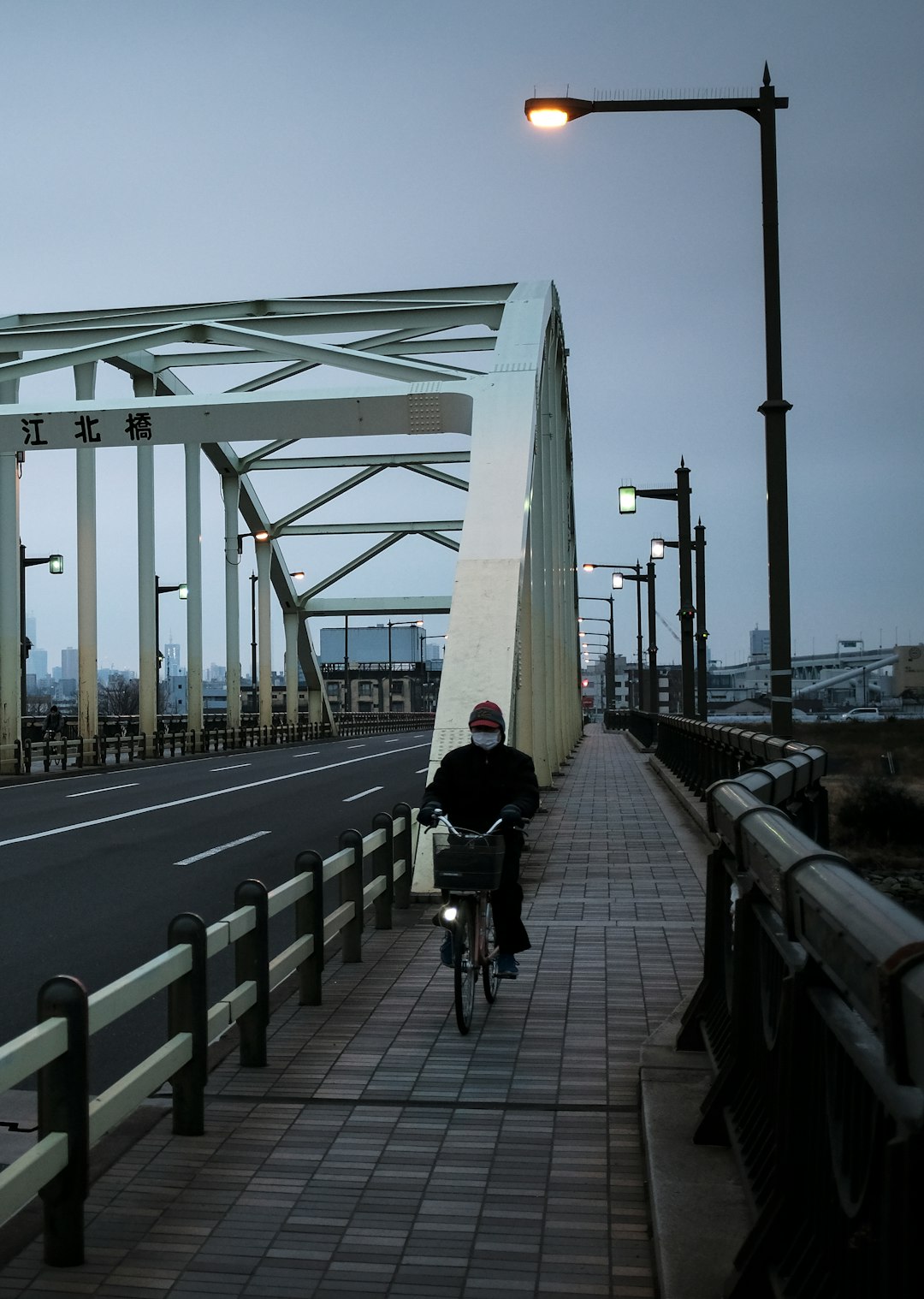 people walking on bridge during daytime