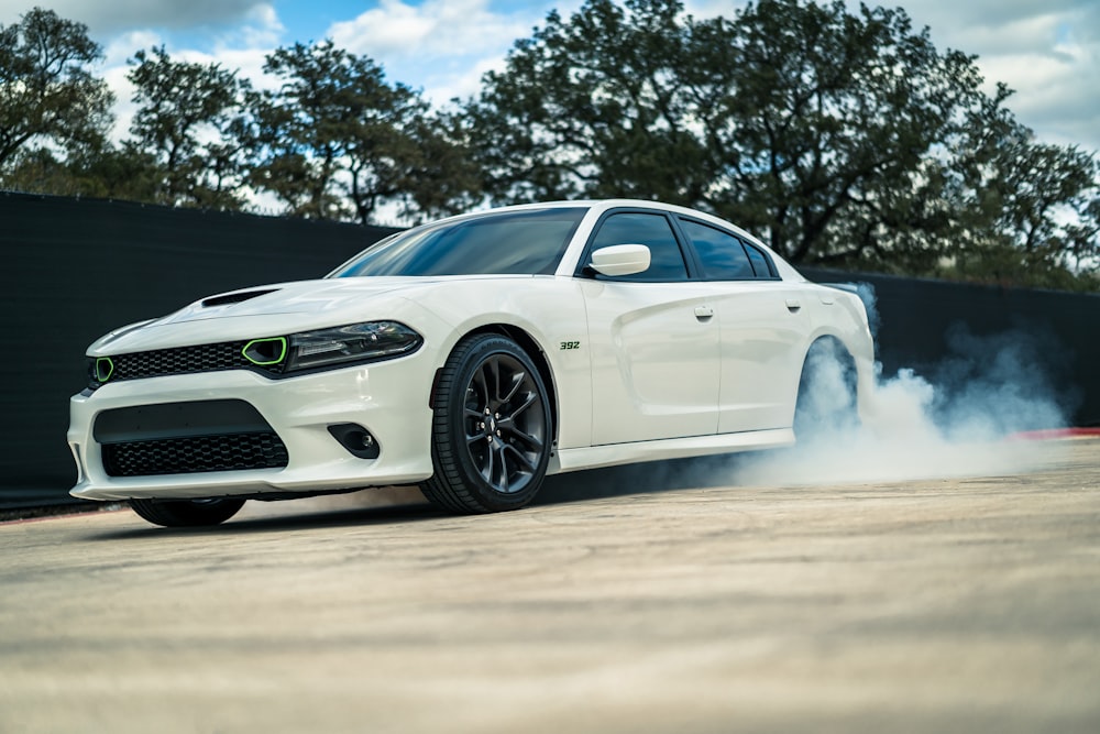 white bmw m 3 coupe on road during daytime