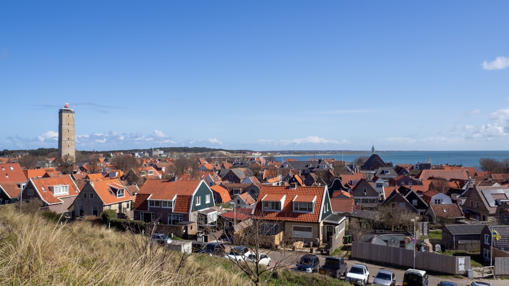 brown and white houses under blue sky during daytime