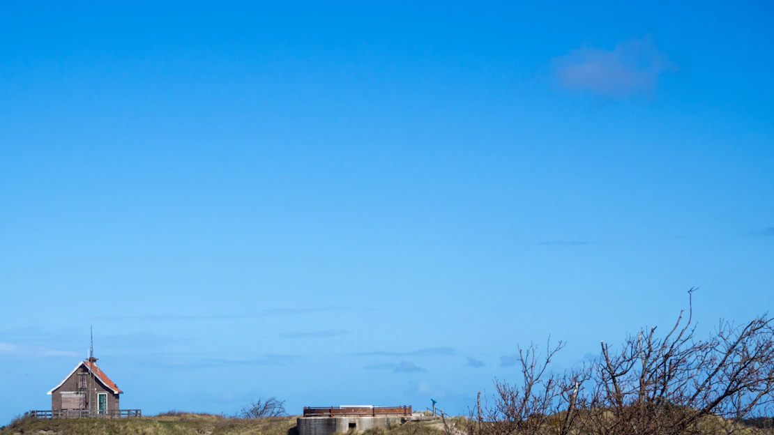 A robust wendy house standing strong against a Northern Cape landscape under a clear blue sky.