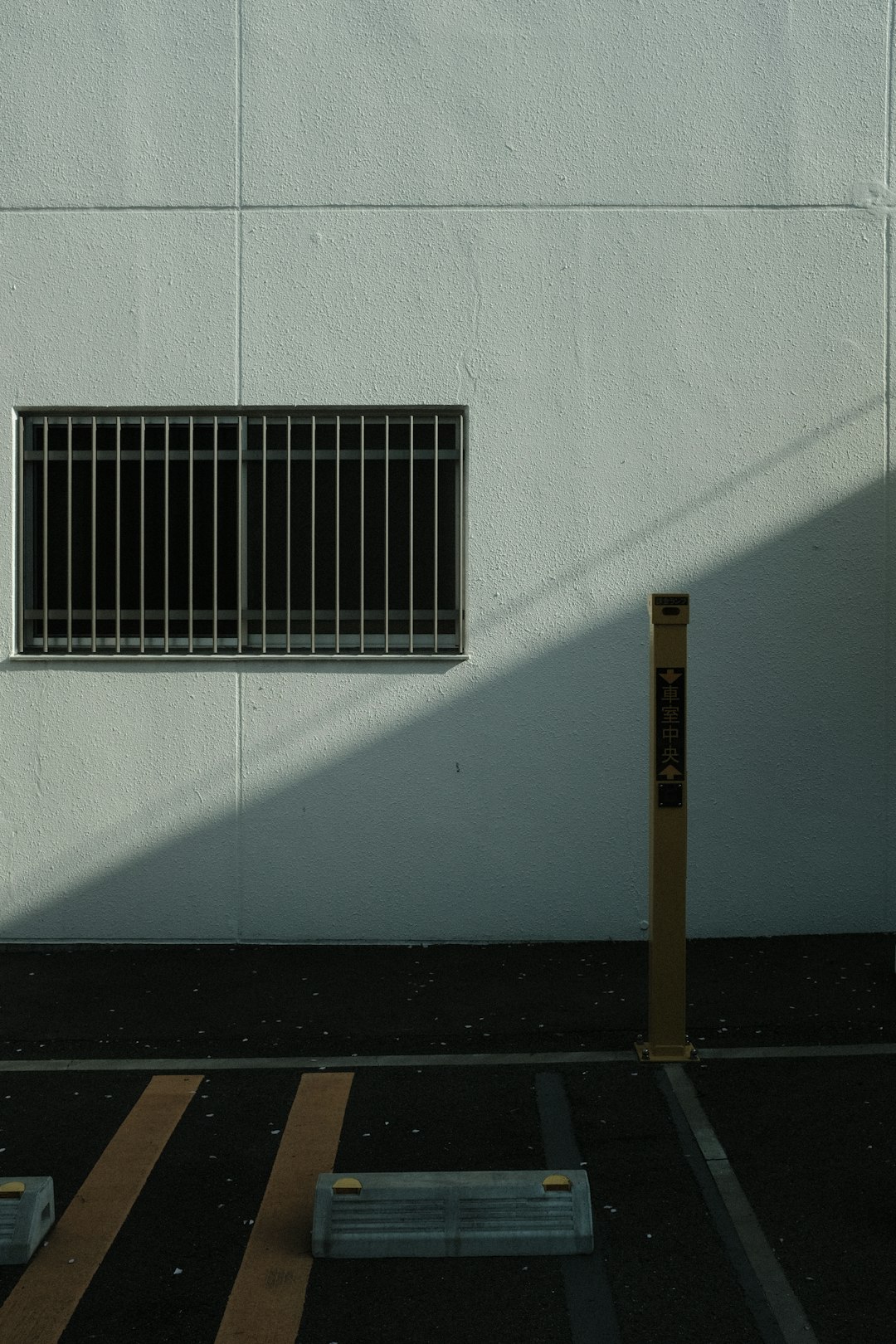 white metal window frame on white wall