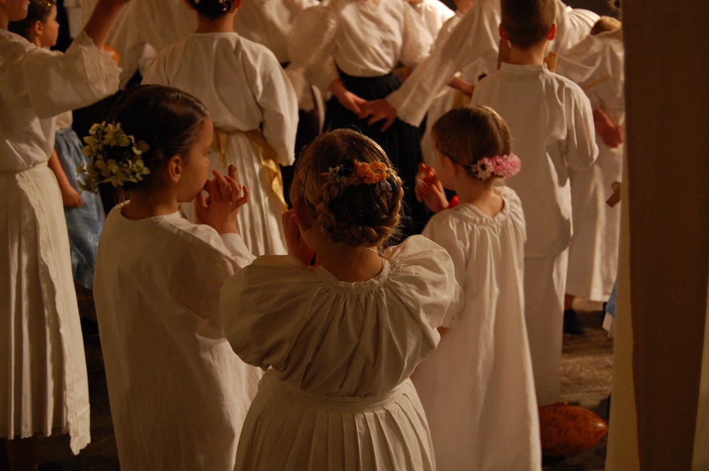 group of people in white dress shirt