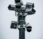 black and gray camera stand