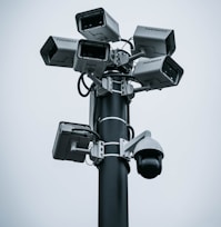 black and gray camera stand