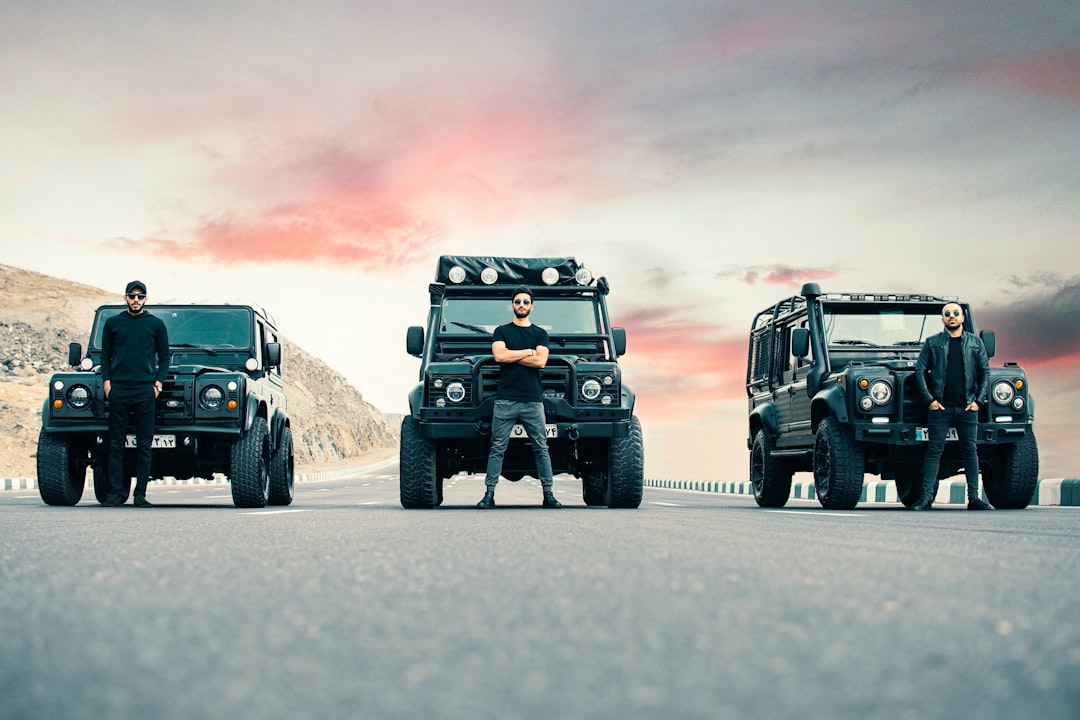 black jeep wrangler on gray asphalt road during daytime