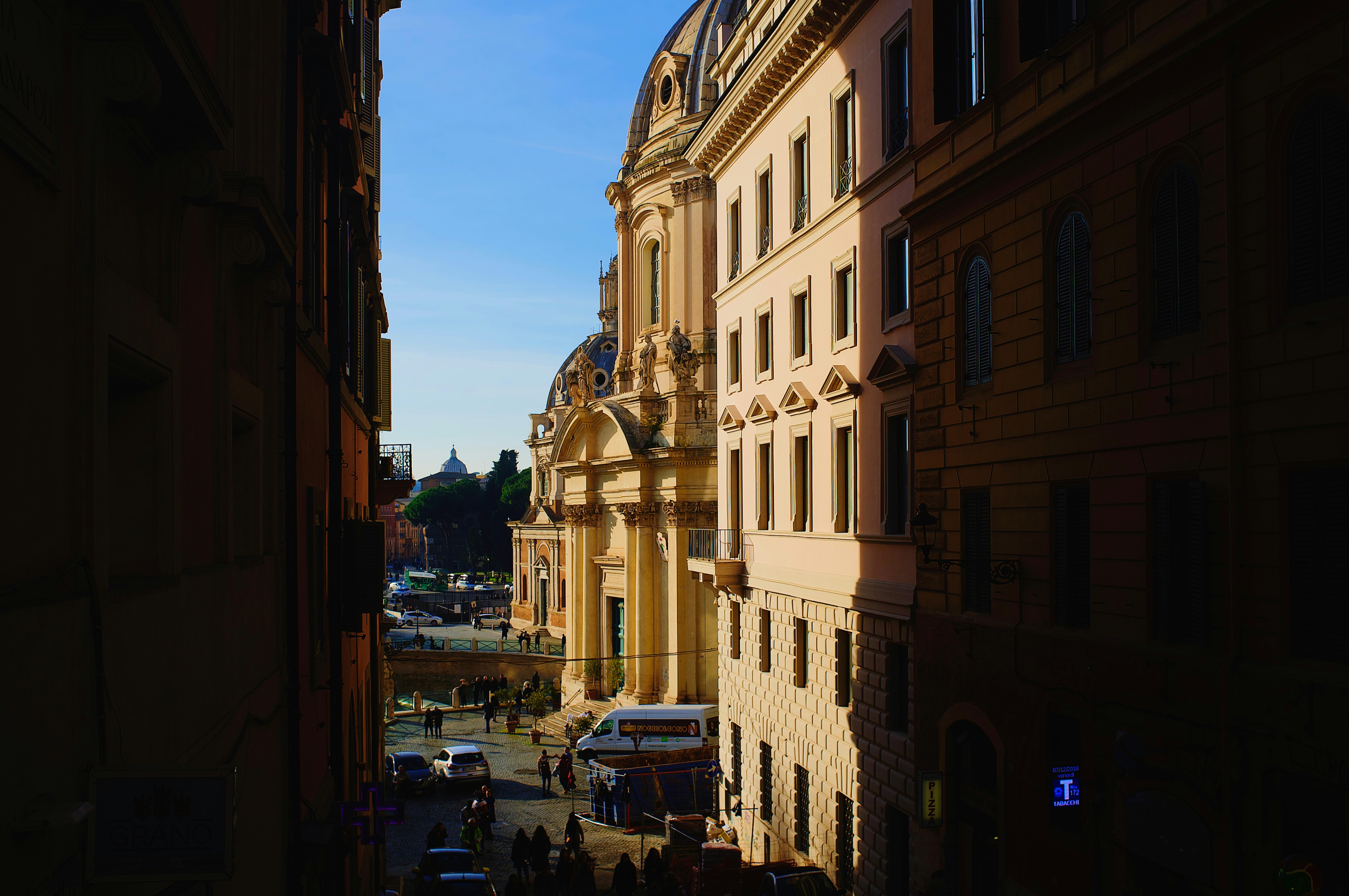 people walking on street near buildings during night time, 