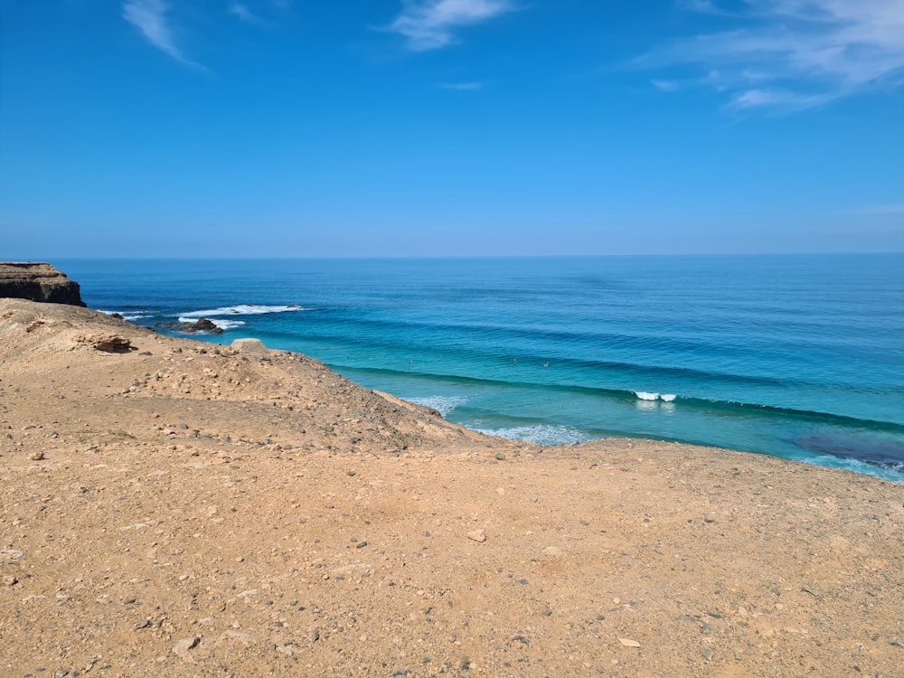 blue sea under blue sky during daytime