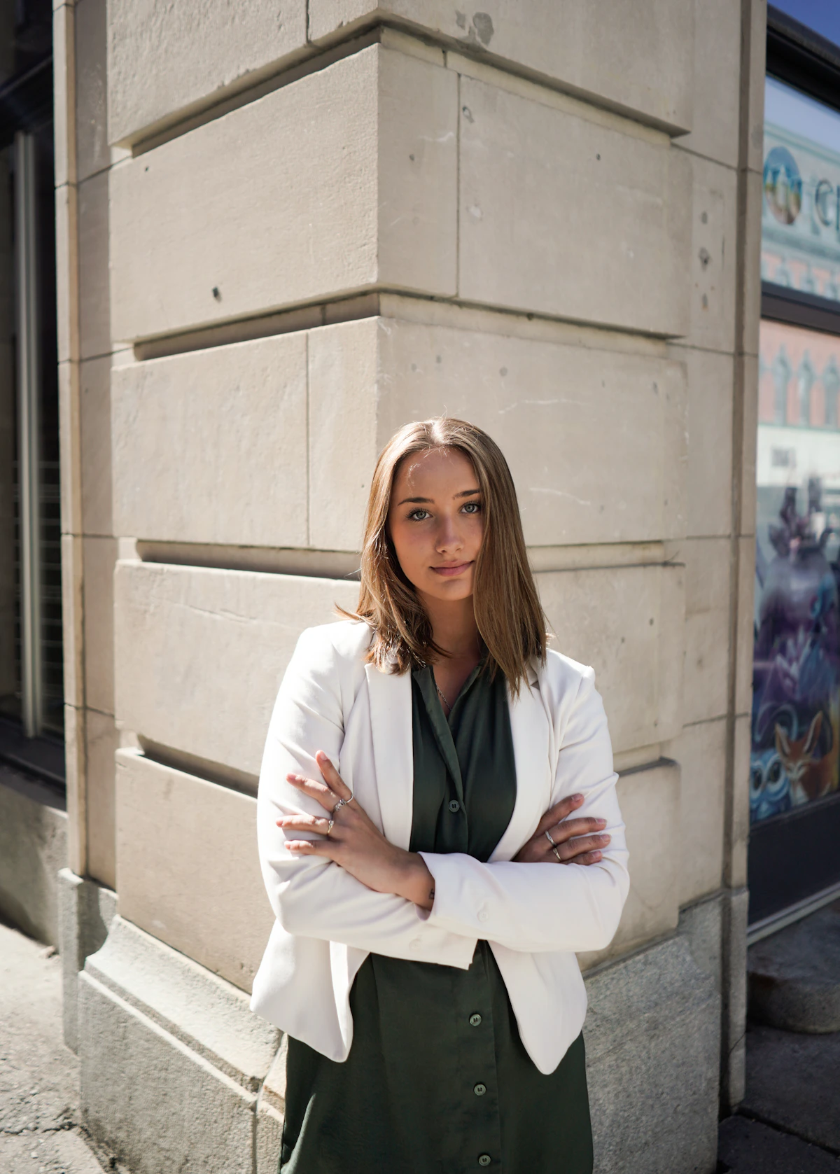 Professional woman in a white blazer