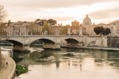 white concrete bridge over river evocative google meet background