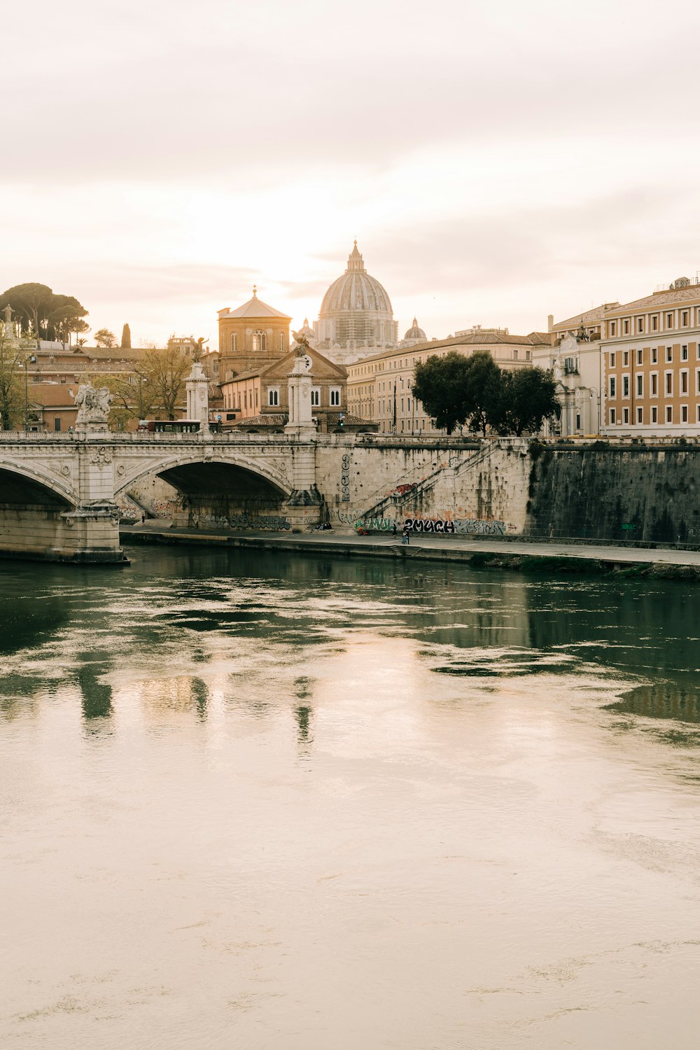 white concrete bridge over river