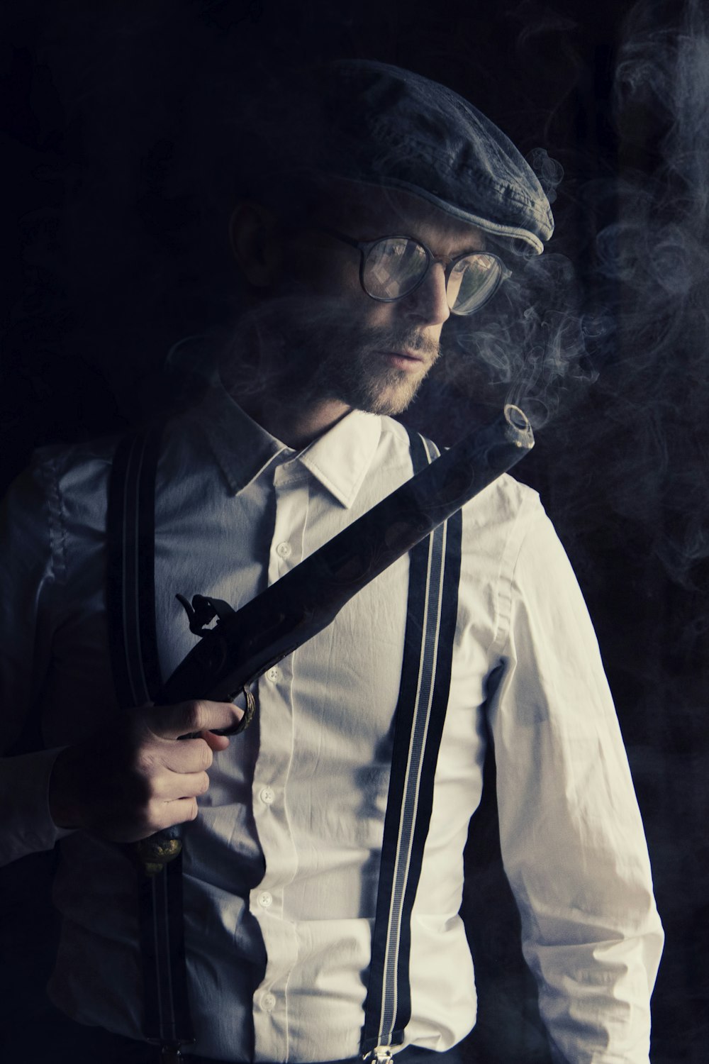 man in white dress shirt wearing black necktie and black sunglasses