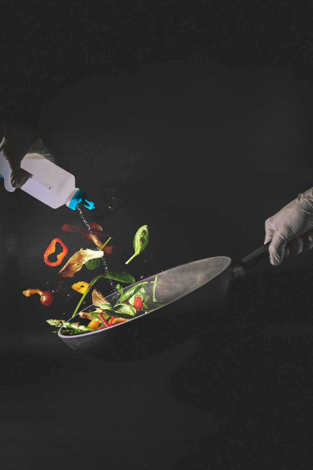 person holding white handled knife slicing vegetable