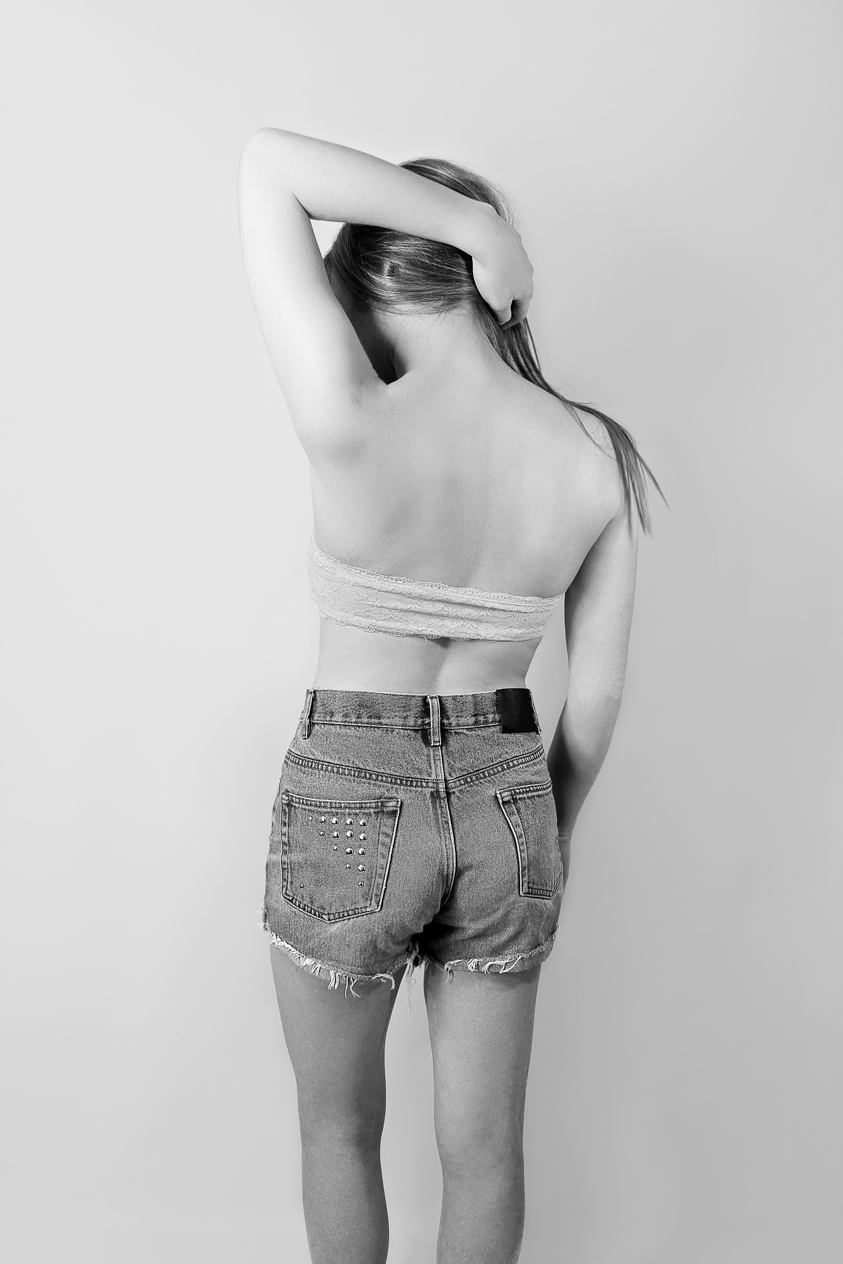 woman in black denim shorts