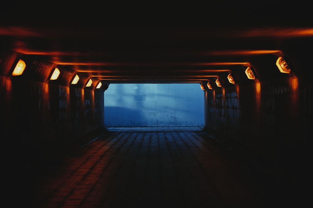 brown wooden hallway with blue light