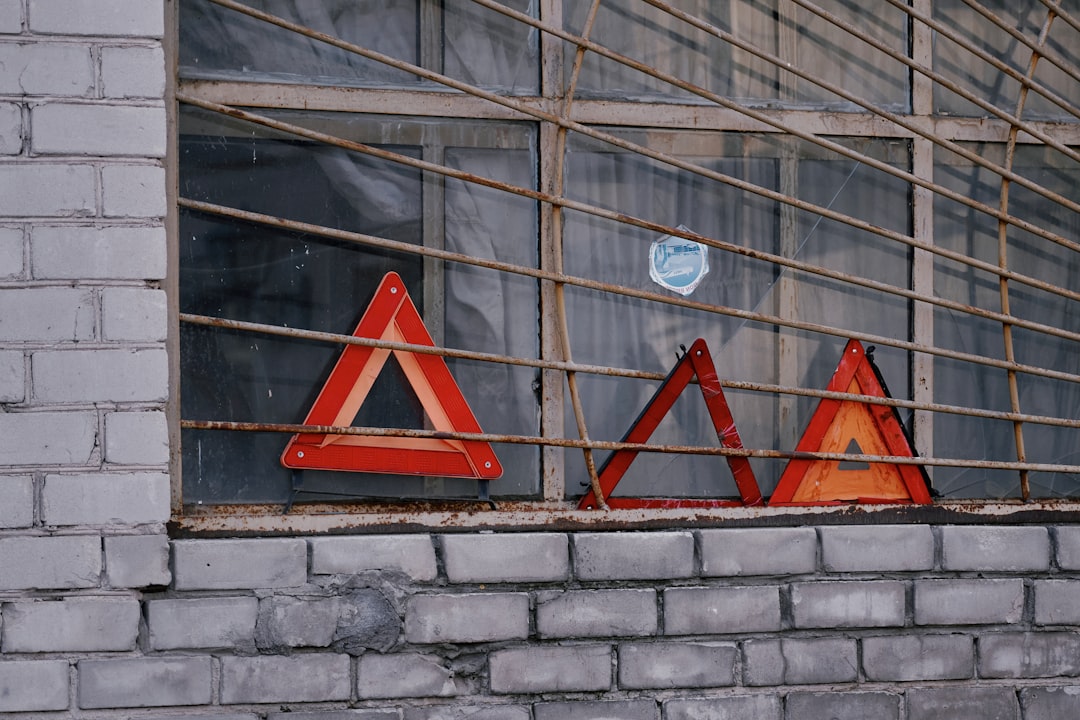 red arrow sign on wall