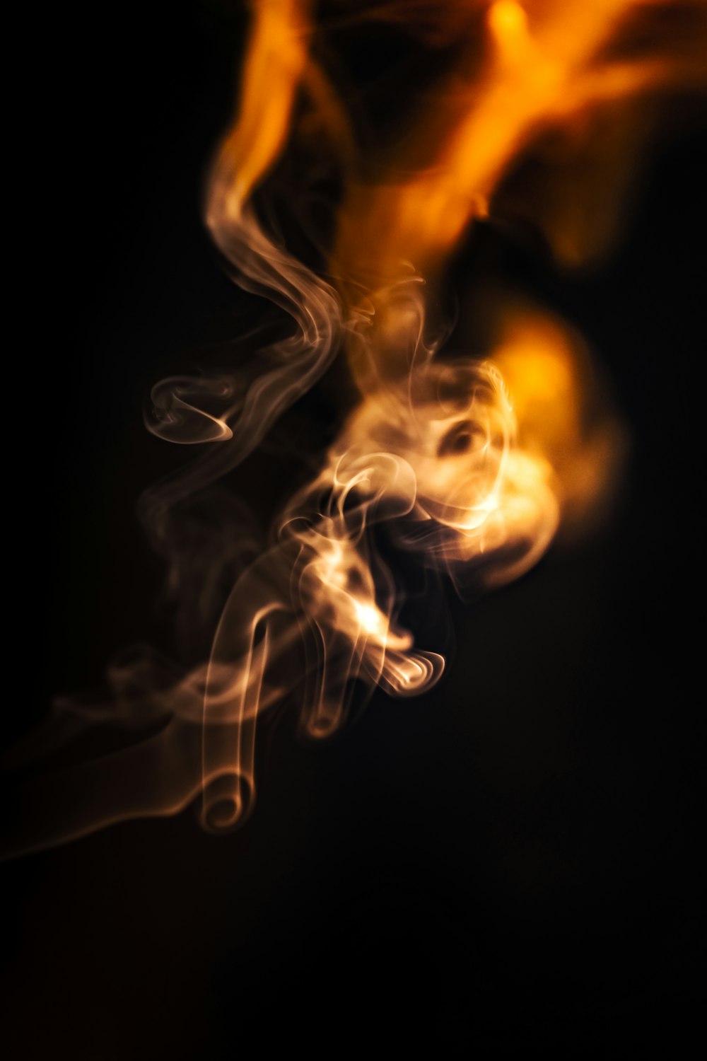 white smoke on black background