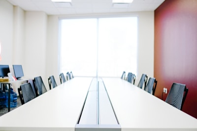 white wooden table with chairs