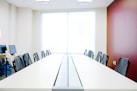 white wooden table with chairs