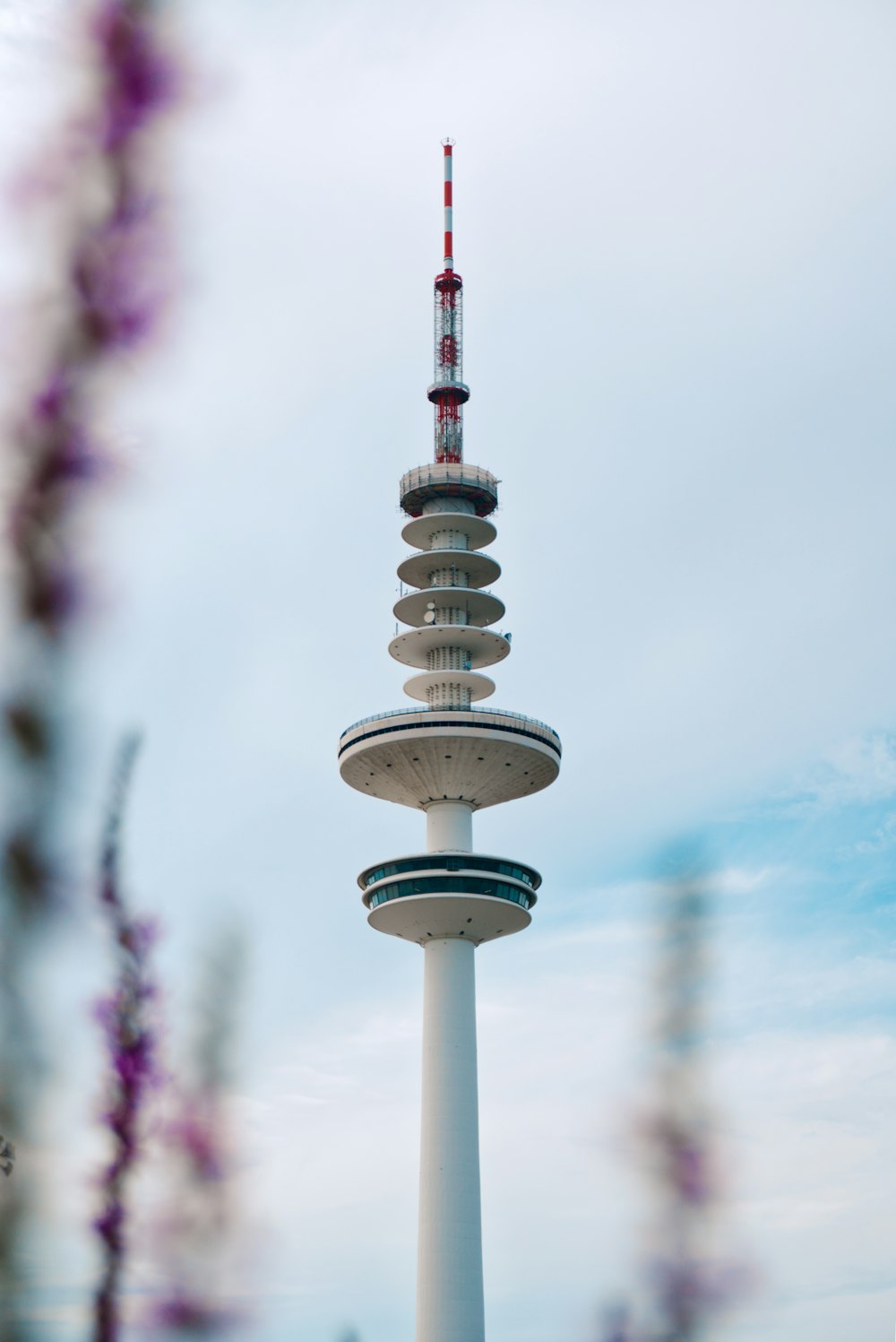 white and red tower during daytime