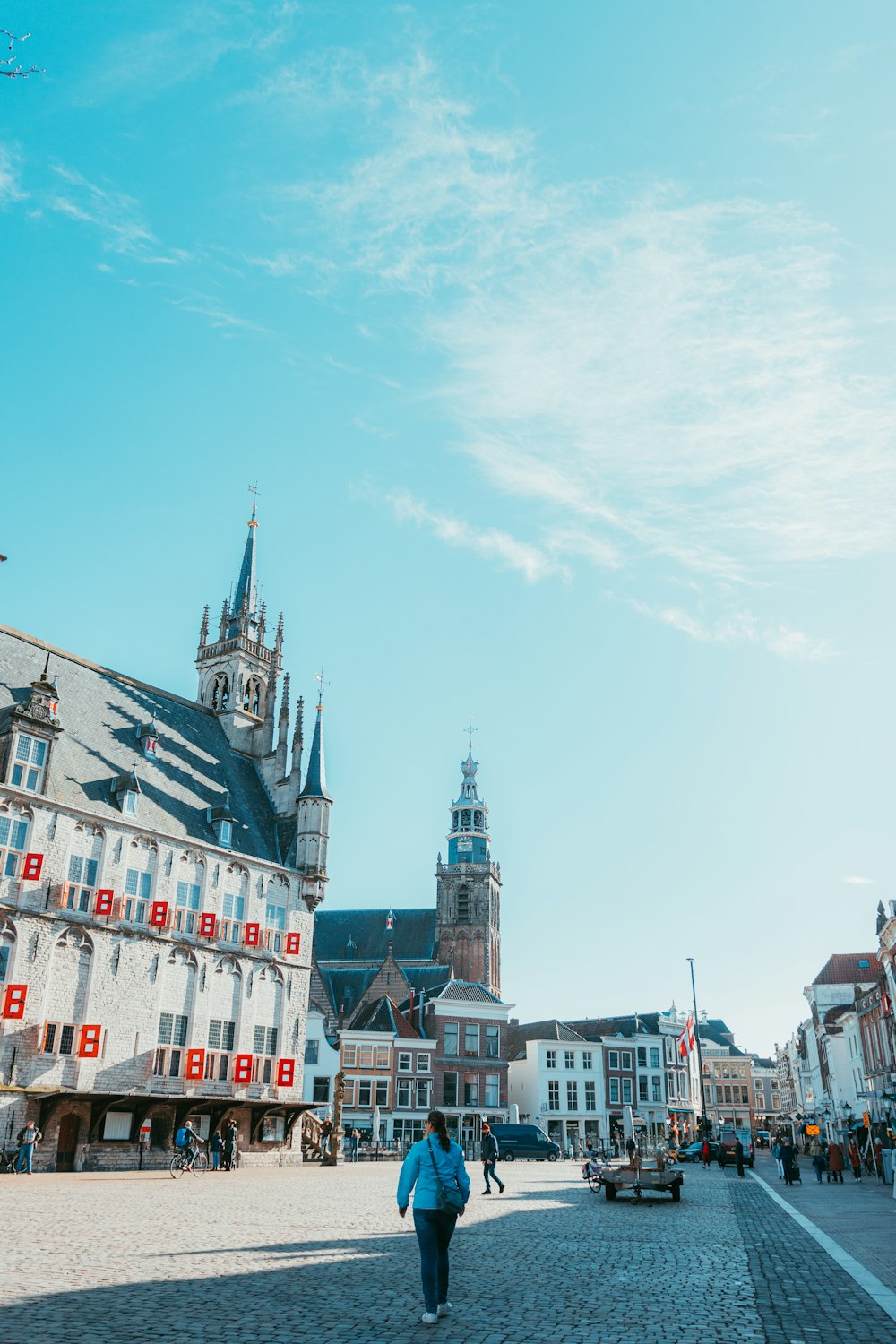 white and red concrete buildings under blue sky during daytime