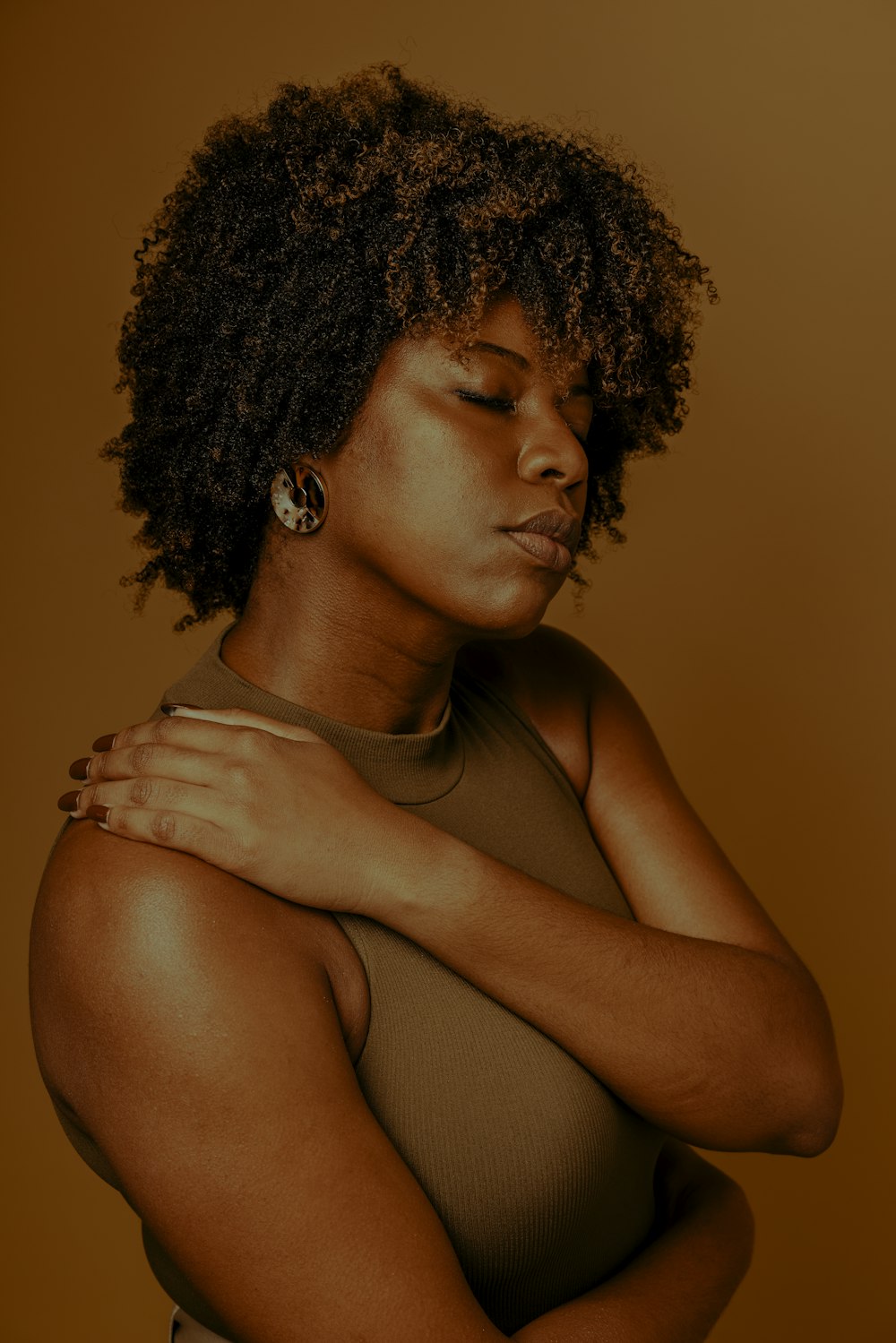 woman in brown tank top