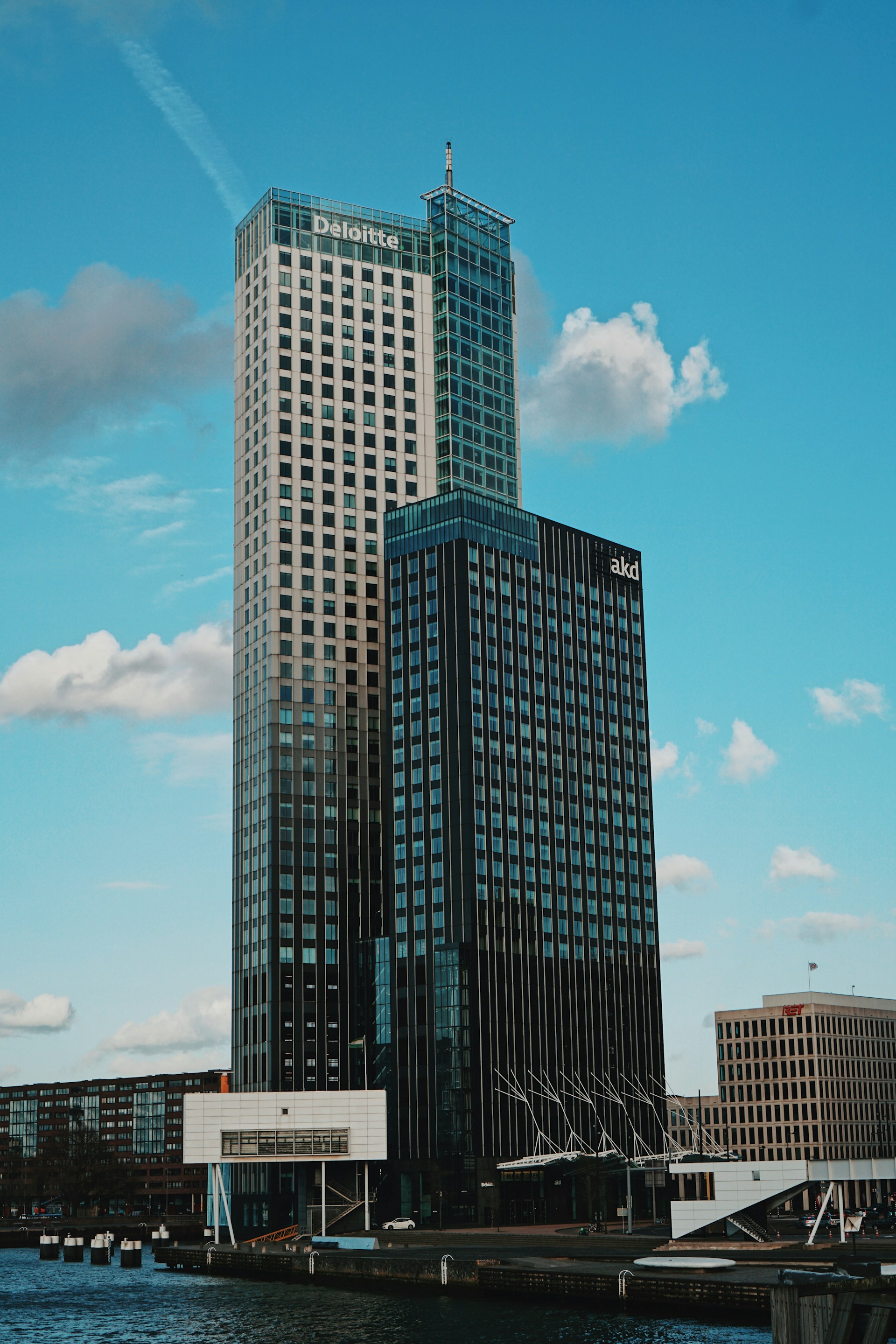 woman wearing yellow long-sleeved dress under white clouds and blue sky during daytime