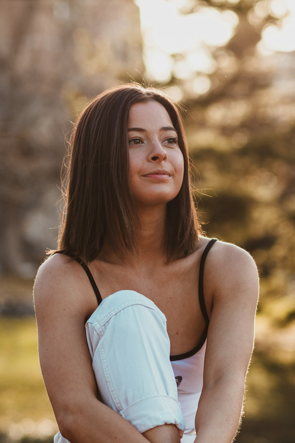 woman in white tank top