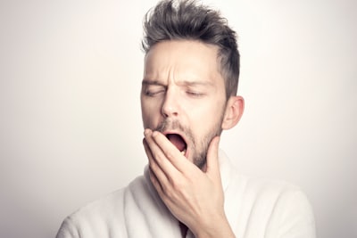 man in white long sleeve shirt sleepy google meet background