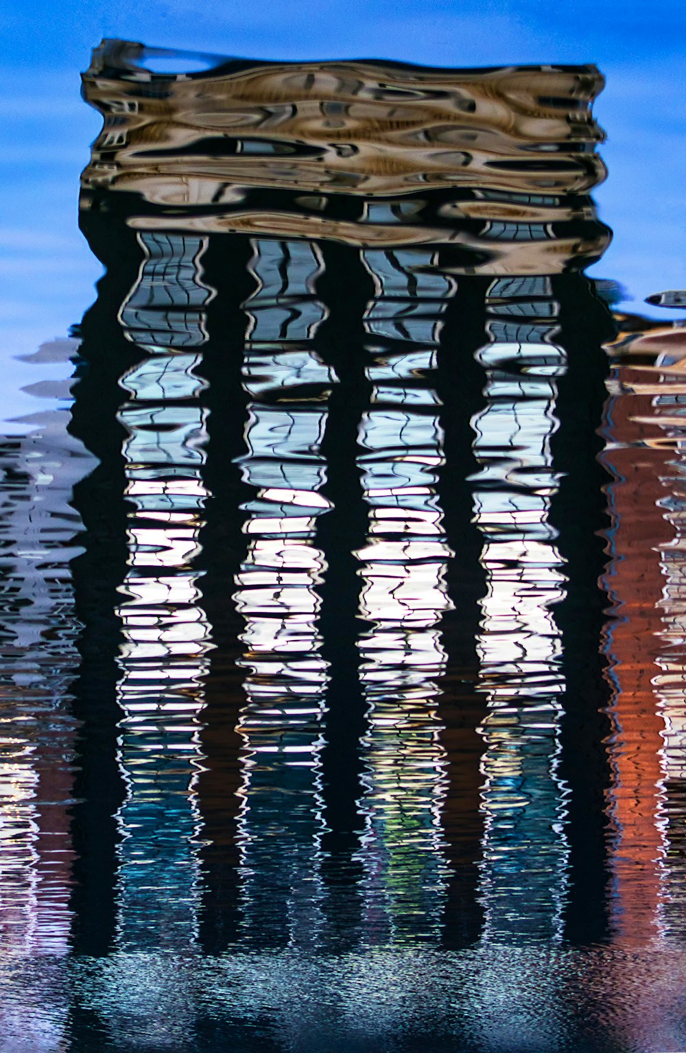 brown wooden dock on water