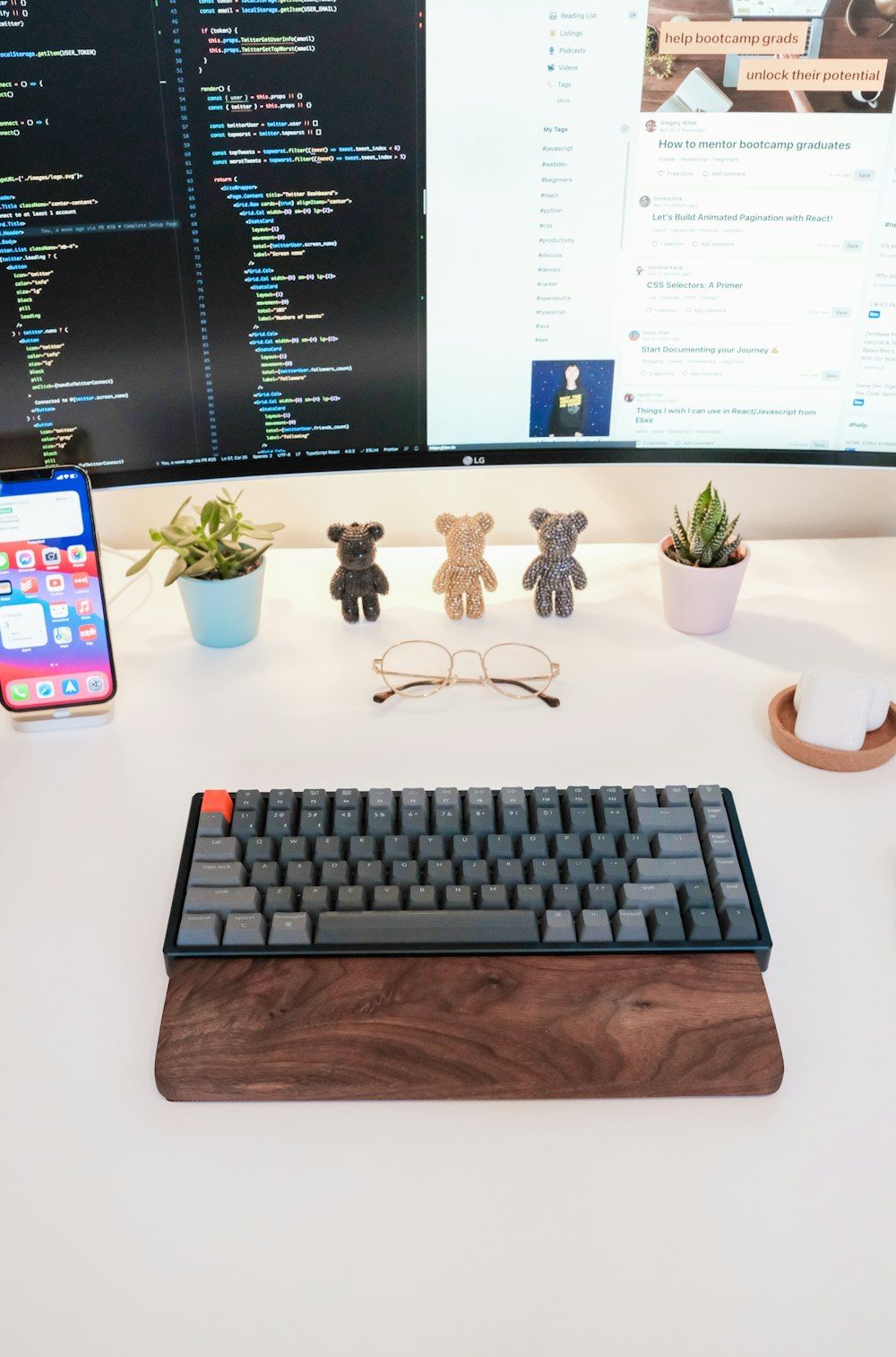 black computer keyboard beside silver imac