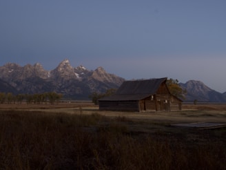 Rustic barn and open field landscape