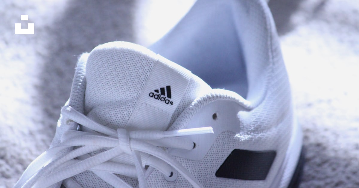 White adidas low top sneakers photo â Free Shoe Image on Unsplash